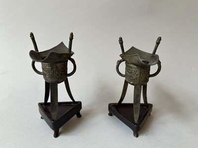 Lot 57 - A PAIR OF CHINESE ARCHAISTIC WHITE METAL LIBATION CUPS, JUE, QING DYNASTY, 19TH CENTURY