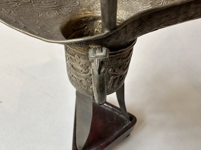 Lot 57 - A PAIR OF CHINESE ARCHAISTIC WHITE METAL LIBATION CUPS, JUE, QING DYNASTY, 19TH CENTURY
