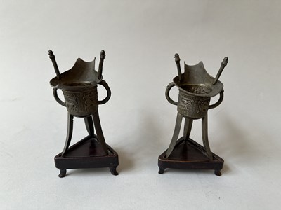 Lot 57 - A PAIR OF CHINESE ARCHAISTIC WHITE METAL LIBATION CUPS, JUE, QING DYNASTY, 19TH CENTURY