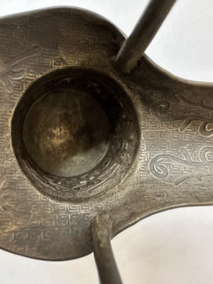 Lot 57 - A PAIR OF CHINESE ARCHAISTIC WHITE METAL LIBATION CUPS, JUE, QING DYNASTY, 19TH CENTURY