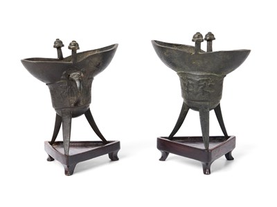 Lot 59 - A PAIR OF ARCHAISTIC BRONZE LIBATION CUPS, JUE, MING DYNASTY