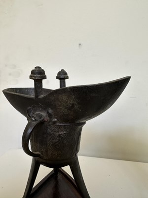 Lot 59 - A PAIR OF ARCHAISTIC BRONZE LIBATION CUPS, JUE, MING DYNASTY