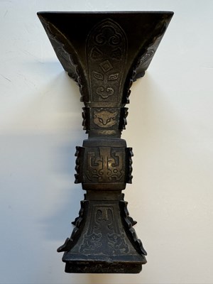 Lot 62 - A CHINESE ARCHAISTIC BRONZE VASE, GU