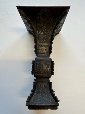 Lot 62 - A CHINESE ARCHAISTIC BRONZE VASE, GU