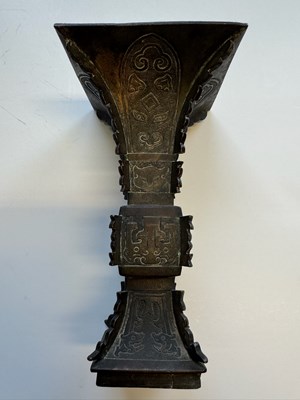 Lot 62 - A CHINESE ARCHAISTIC BRONZE VASE, GU