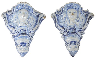 Lot 21 - A PAIR OF BLUE AND WHITE ENGLISH DELFTWARE EARTHWARE WALL POCKETS