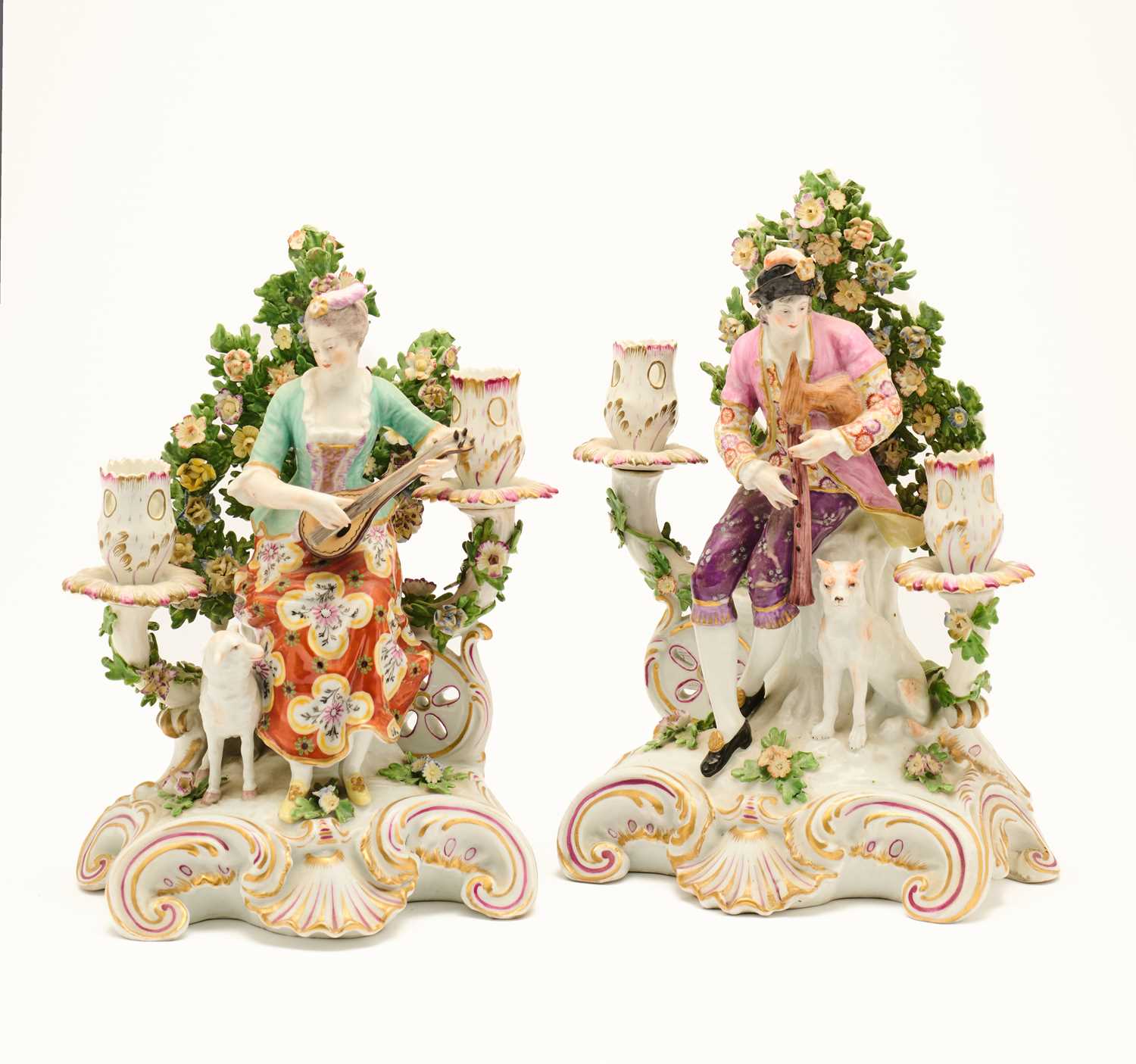Lot 24 - A PAIR OF CONTINENTAL PORCELAIN FIGURAL CANDELABRA, PROBABLY SAMSON, LATE 19TH CENTURY