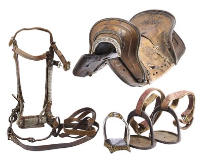 Lot 2 - A TIBETAN SADDLE, BRIDLE, AND A PAIR OF STIRRUPS, 18TH/19TH CENTURY OR EARLIER