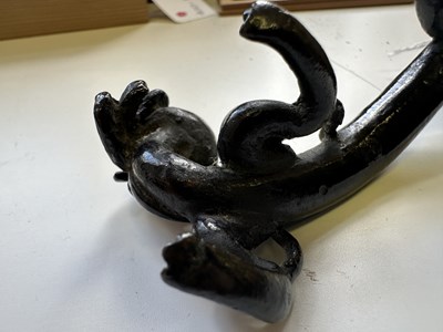 Lot 54 - A CHINESE BRONZE 'CHILONG' BRUSHREST, 17TH CENTURY
