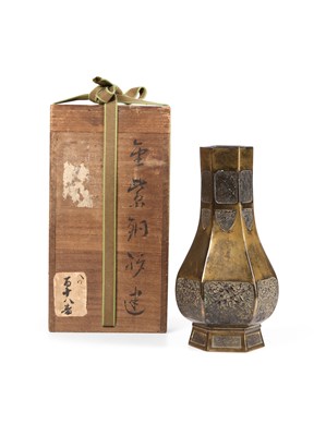 Lot 61 - A CHINESE PARCEL-GILT BRONZE HEXAGONALLY LOBED BOTTLE VASE, QING DYNASTY, 18TH CENTURY