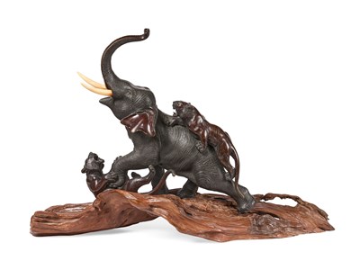 Lot 144 - A JAPANESE BRONZE OKIMONO OF AN ELEPHANT ATTACKED BY TIGERS, SIGNED JONAN, MEIJI PERIOD (1868-1912)