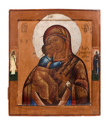 Lot 50 - A RUSSIAN ICON OF THE VIRGIN OF VLADIMIR WITH THE GUARDIAN ANGEL AND SAINT XENIA, LATE 18TH CENTURY
