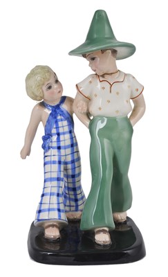 Lot 44 - A GOLDSCHEIDER GROUP OF A BOY AND GIRL