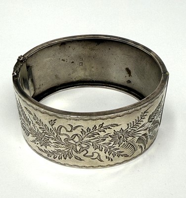 Lot 372 - TWO HINGED SILVER BANGLES, 1883 & 1909
