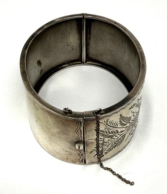 Lot 372 - TWO HINGED SILVER BANGLES, 1883 & 1909