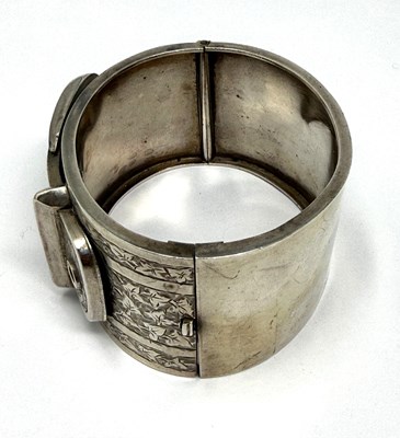 Lot 372 - TWO HINGED SILVER BANGLES, 1883 & 1909