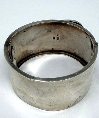 Lot 372 - TWO HINGED SILVER BANGLES, 1883 & 1909