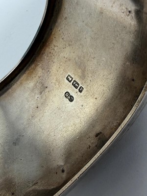 Lot 372 - TWO HINGED SILVER BANGLES, 1883 & 1909