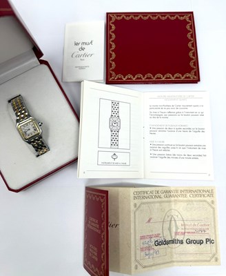 Lot 339 - CARTIER, PANTHERE, REF.1120: LADY'S GOLD AND STAINLESS STEEL BRACELET WATCH, CIRCA 1997