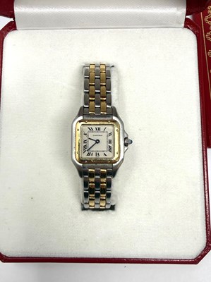 Lot 339 - CARTIER, PANTHERE, REF.1120: LADY'S GOLD AND STAINLESS STEEL BRACELET WATCH, CIRCA 1997