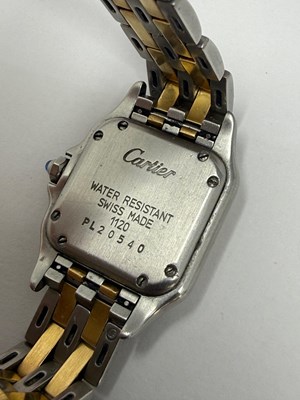 Lot 339 - CARTIER, PANTHERE, REF.1120: LADY'S GOLD AND STAINLESS STEEL BRACELET WATCH, CIRCA 1997