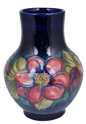 Lot 52 - A MOORCROFT 'CLEMATIS' BALUSTER VASE