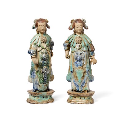 Lot 83 - A PAIR OF CHINESE SHIWAN GLAZED STONEWARE FIGURES OF COURT LADIES, QING DYNASTY, CIRCA 1900