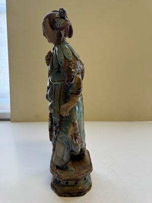 Lot 83 - A PAIR OF CHINESE SHIWAN GLAZED STONEWARE FIGURES OF COURT LADIES, QING DYNASTY, CIRCA 1900