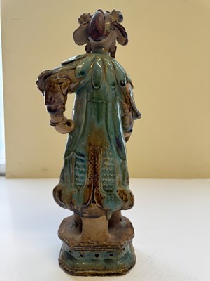 Lot 83 - A PAIR OF CHINESE SHIWAN GLAZED STONEWARE FIGURES OF COURT LADIES, QING DYNASTY, CIRCA 1900
