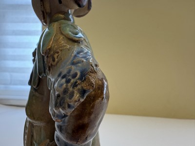 Lot 83 - A PAIR OF CHINESE SHIWAN GLAZED STONEWARE FIGURES OF COURT LADIES, QING DYNASTY, CIRCA 1900