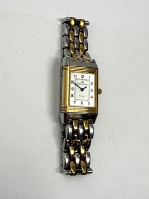 Lot 327 - JAEGER-LECOULTRE, REVERSO, REF.260.550.082: LADY'S STAINLESS STEEL AND GOLD BRACELET WATCH, CIRCA 2002