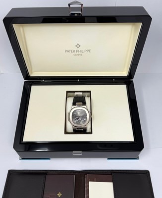 Lot 323 - PATEK PHILIPPE, NAUTILUS, REF.5712G-001: GENTLEMAN'S WHITE GOLD WRISTWATCH, CIRCA 2009