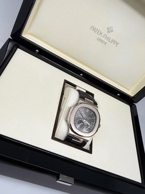 Lot 323 - PATEK PHILIPPE, NAUTILUS, REF.5712G-001: GENTLEMAN'S WHITE GOLD WRISTWATCH, CIRCA 2009