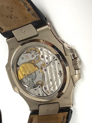 Lot 323 - PATEK PHILIPPE, NAUTILUS, REF.5712G-001: GENTLEMAN'S WHITE GOLD WRISTWATCH, CIRCA 2009