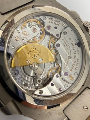 Lot 323 - PATEK PHILIPPE, NAUTILUS, REF.5712G-001: GENTLEMAN'S WHITE GOLD WRISTWATCH, CIRCA 2009