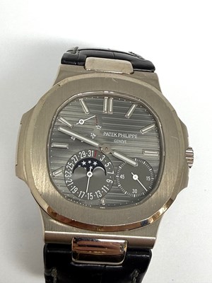Lot 323 - PATEK PHILIPPE, NAUTILUS, REF.5712G-001: GENTLEMAN'S WHITE GOLD WRISTWATCH, CIRCA 2009