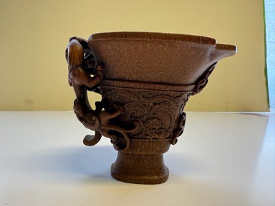 Lot 31 - A CHINESE CARVED BAMBOO 'CHILONG' LIBATION CUP, QING DYNASTY, EARLY 19TH CENTURY