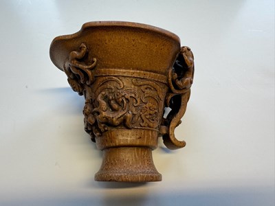 Lot 31 - A CHINESE CARVED BAMBOO 'CHILONG' LIBATION CUP, QING DYNASTY, EARLY 19TH CENTURY