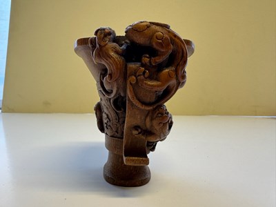 Lot 31 - A CHINESE CARVED BAMBOO 'CHILONG' LIBATION CUP, QING DYNASTY, EARLY 19TH CENTURY