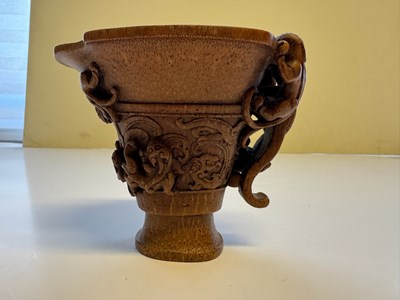 Lot 31 - A CHINESE CARVED BAMBOO 'CHILONG' LIBATION CUP, QING DYNASTY, EARLY 19TH CENTURY