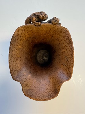 Lot 31 - A CHINESE CARVED BAMBOO 'CHILONG' LIBATION CUP, QING DYNASTY, EARLY 19TH CENTURY