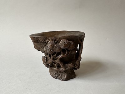 Lot 32 - A CHINESE CARVED BAMBOO 'PINE TREE' LIBATION CUP, QING DYNASTY, 19TH CENTURY