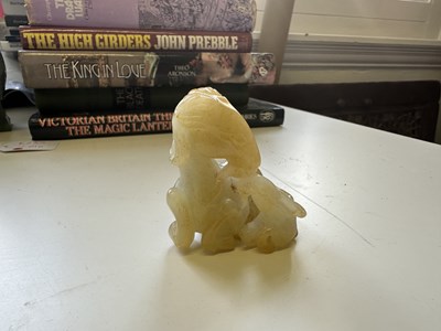 Lot 23 - A CHINESE PALE CELADON JADE RAM GROUP, QING DYNASTY, 18TH CENTURY