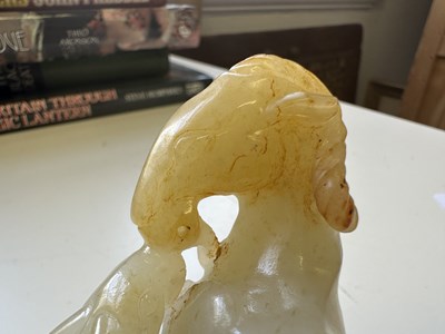 Lot 23 - A CHINESE PALE CELADON JADE RAM GROUP, QING DYNASTY, 18TH CENTURY