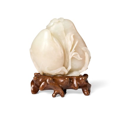 Lot 22 - A CHINESE PALE CELADON JADE 'PEACH AND BAT' GROUP, QING DYNASTY, 18TH CENTURY