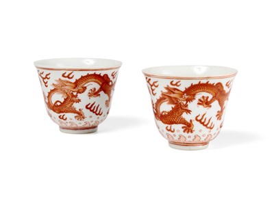 Lot 78 - A PAIR OF IRON-RED 'DRAGON' CUPS, TONGZHI MARKS AND OF THE PERIOD (1862-74)