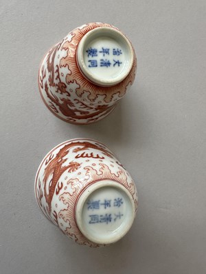 Lot 78 - A PAIR OF IRON-RED 'DRAGON' CUPS, TONGZHI MARKS AND OF THE PERIOD (1862-74)