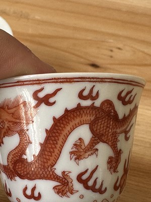 Lot 78 - A PAIR OF IRON-RED 'DRAGON' CUPS, TONGZHI MARKS AND OF THE PERIOD (1862-74)