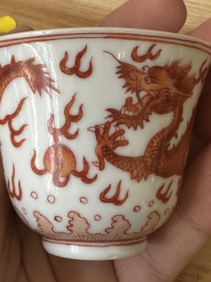 Lot 78 - A PAIR OF IRON-RED 'DRAGON' CUPS, TONGZHI MARKS AND OF THE PERIOD (1862-74)