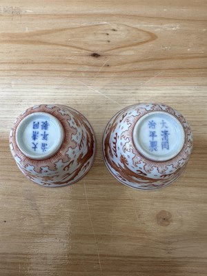 Lot 78 - A PAIR OF IRON-RED 'DRAGON' CUPS, TONGZHI MARKS AND OF THE PERIOD (1862-74)